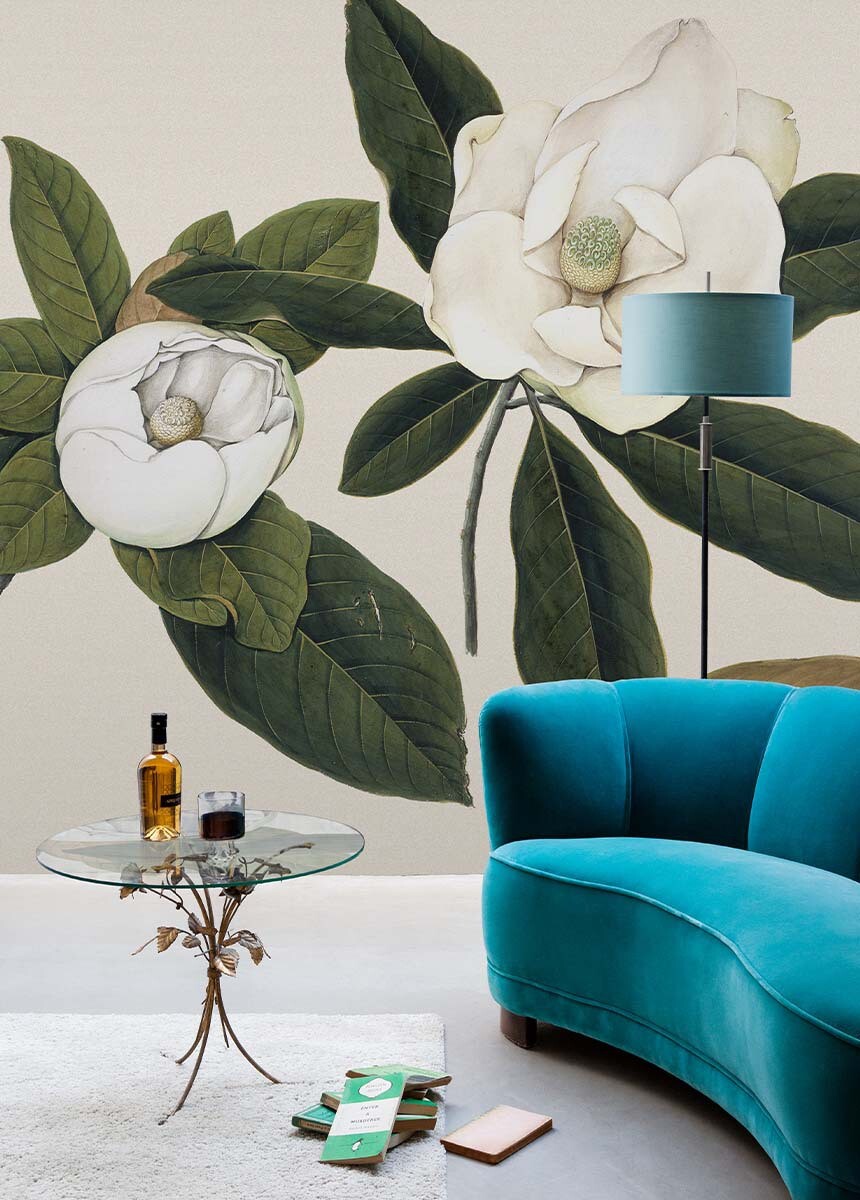 large white flower wall mural on the back wall of a livingroom