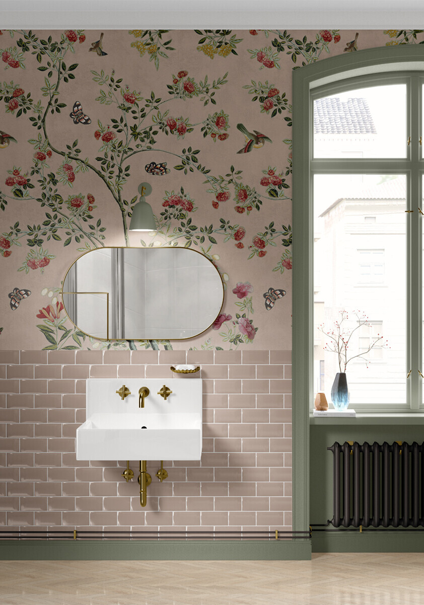 A gorgeous pink chinoiserie wallpaper mural in a pink bathroom