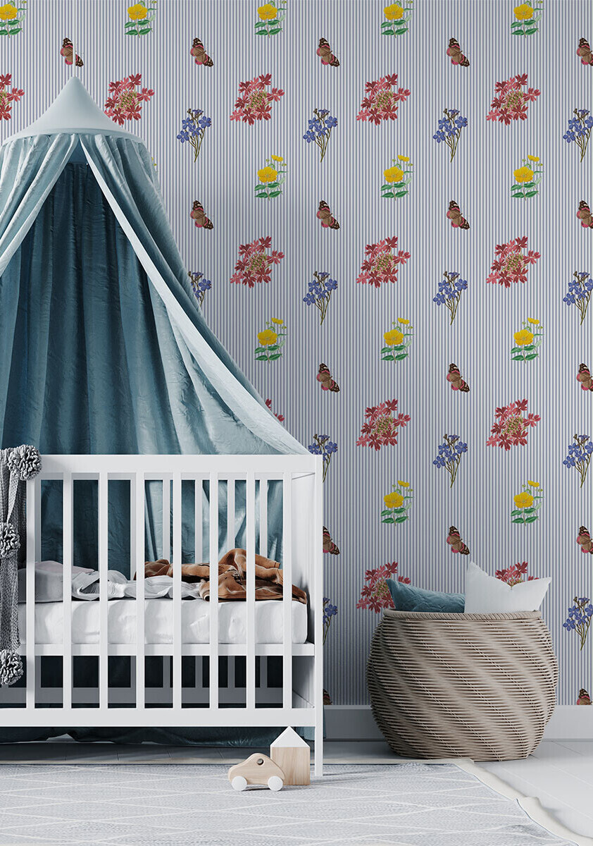 Blue pinstripe wallpaper in a nursery setting 