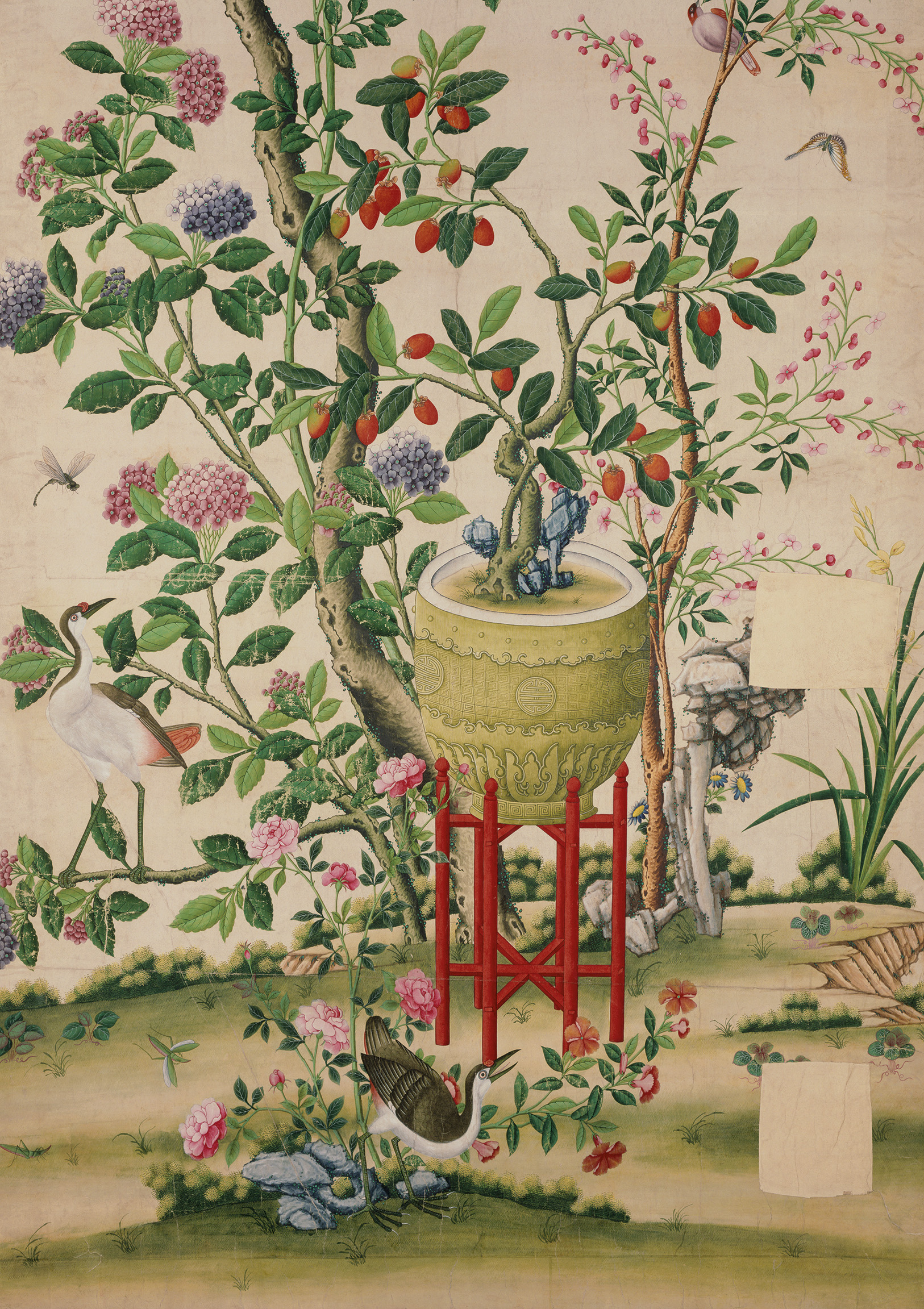 Flower vase on stool with flowering tree